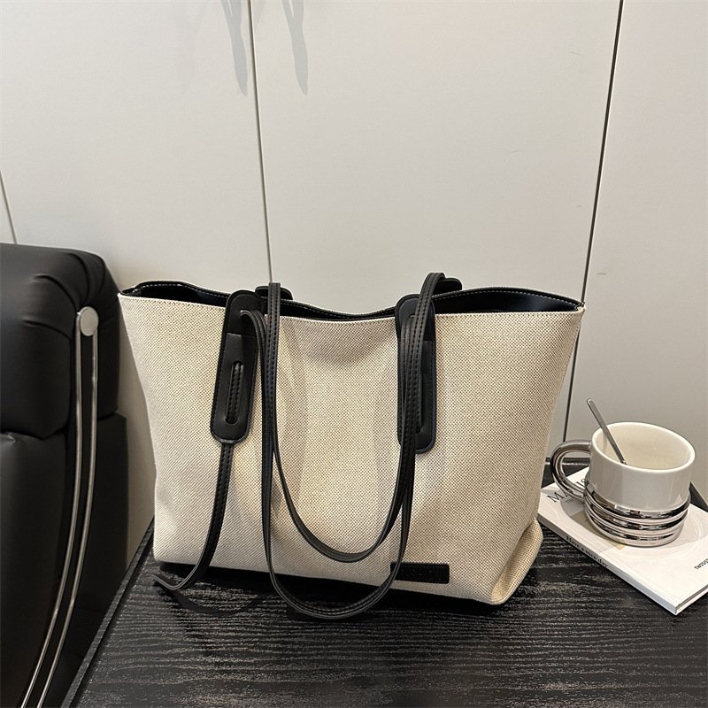 Canvas bag women's large-capacity niche cloth bag shoulder bag texture portable commuter armpit tote bag
