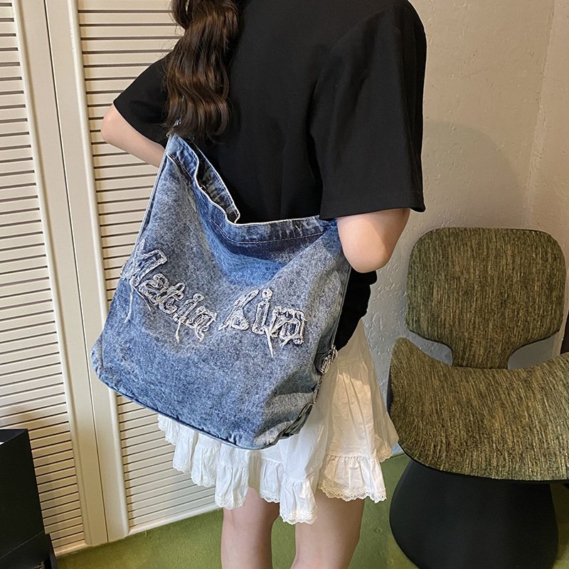 Large-capacity high-end commuter tote bag female denim one-pack three-use student cross-body tablet backpack
