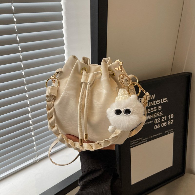 Small Fresh and Western Style Drawstring Shoulder Bag Women's Versatile Crossbody Bag Bucket Bag