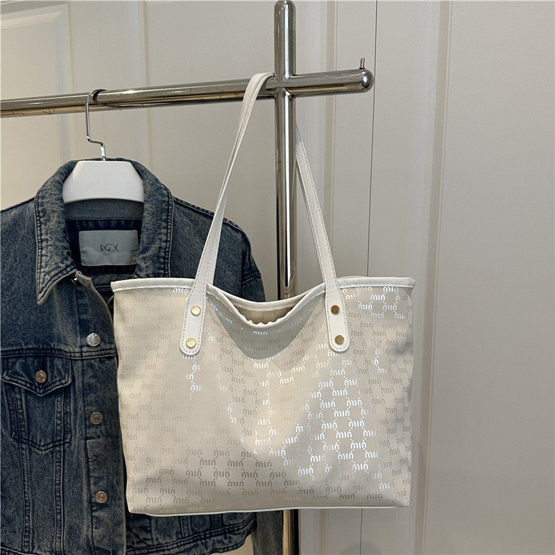 Large-capacity bag women's commuting personality tote bag niche versatile one-shoulder crossbody bag to carry in class